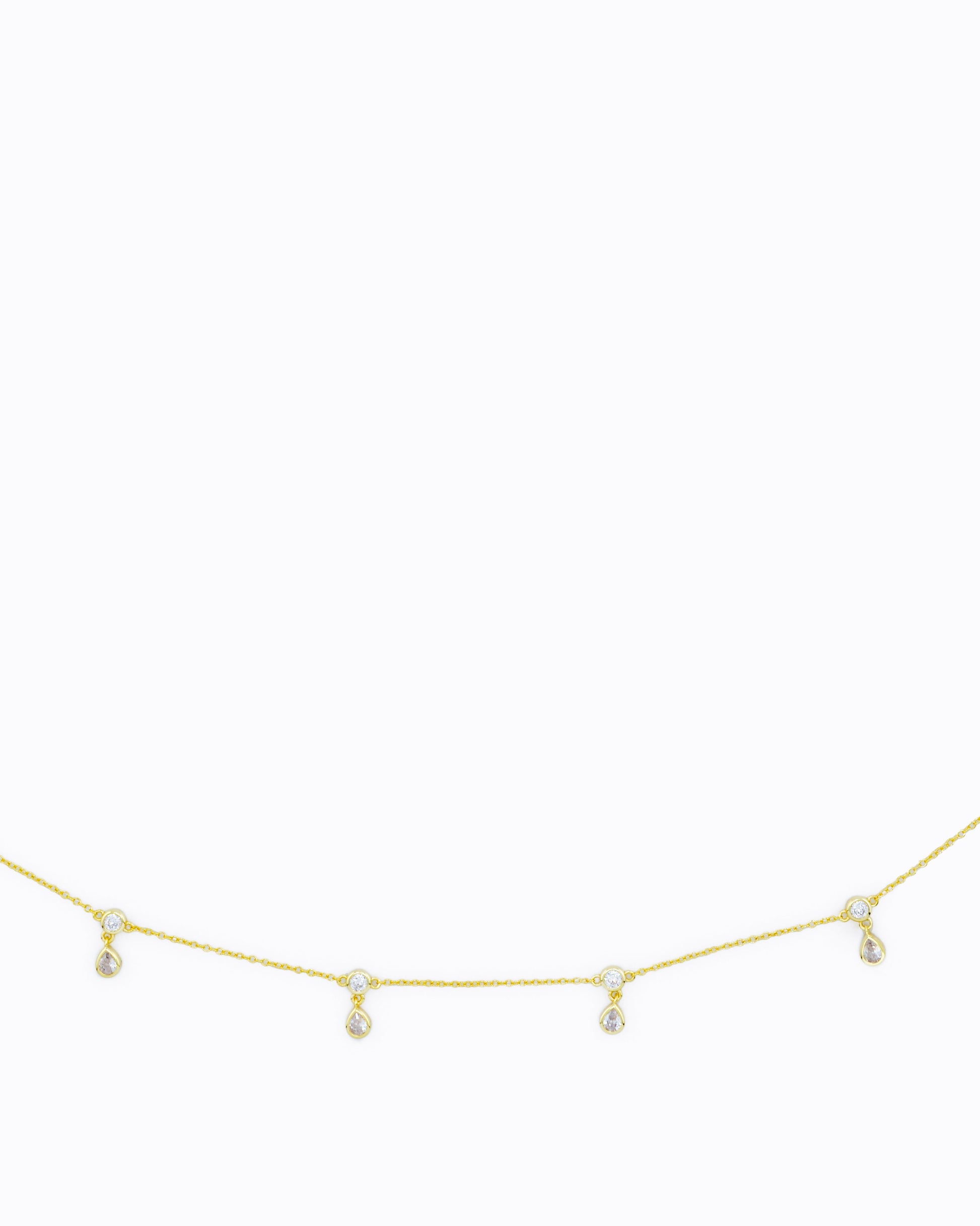 Close up of 14k gold vermeil belly chain with CZ droplet accents